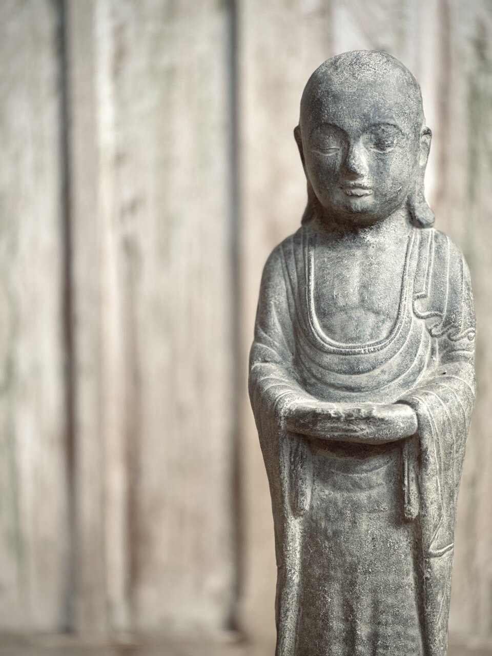 STANDING BUDDHA, antique grey stone