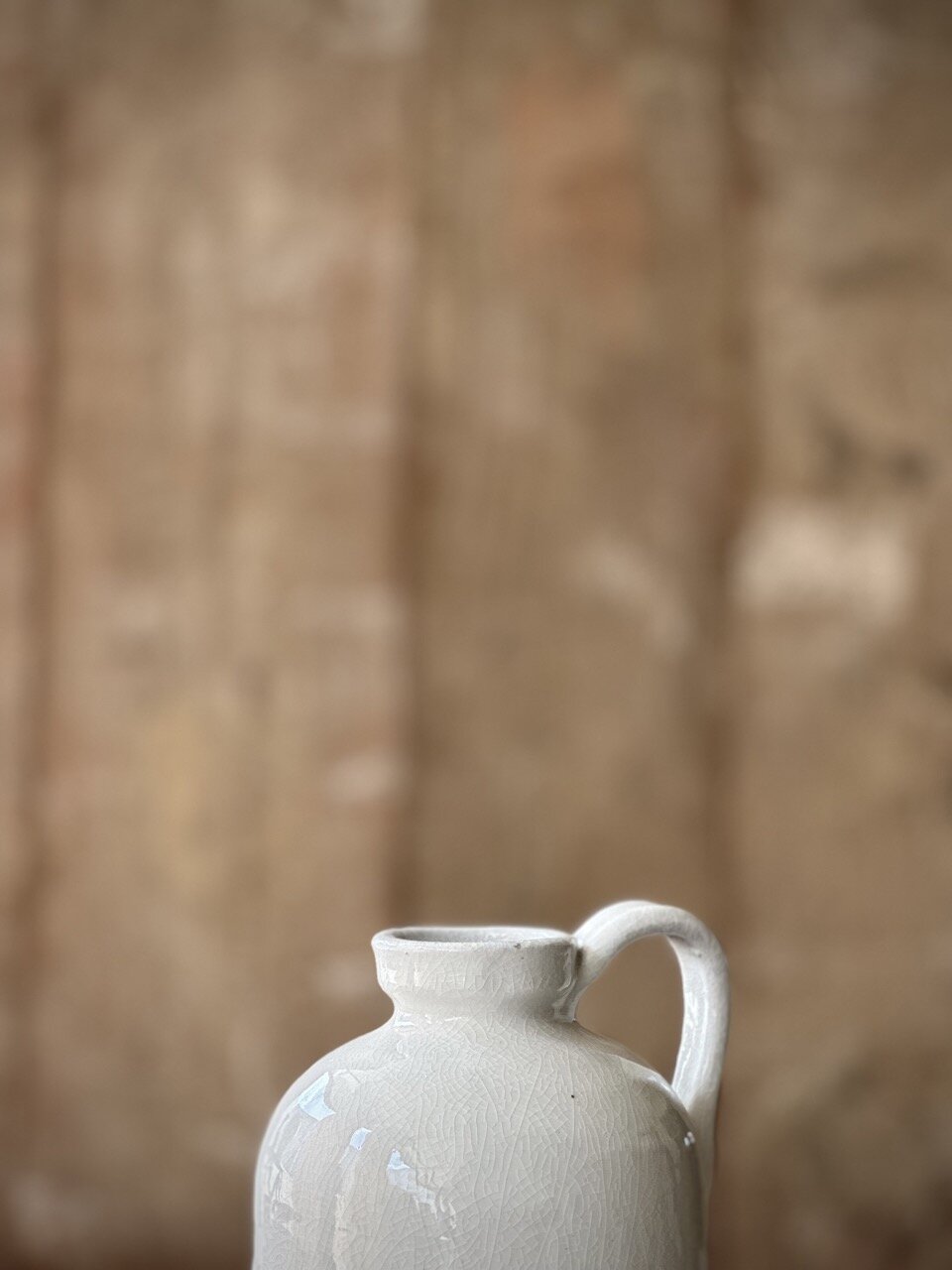 LUC bottle vase with handle, off white crackle glazed