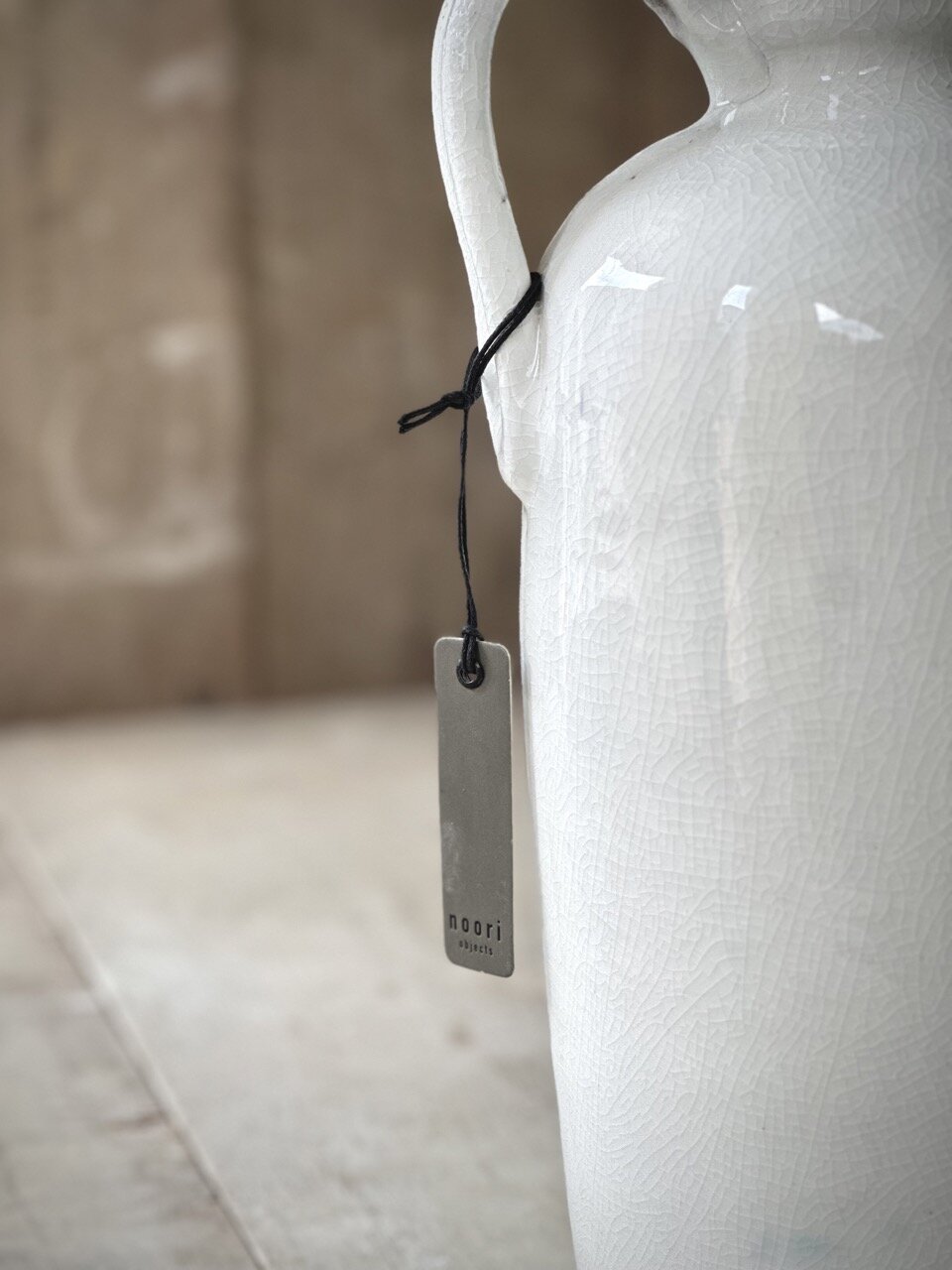LUC bottle vase with handle, off white crackle glazed