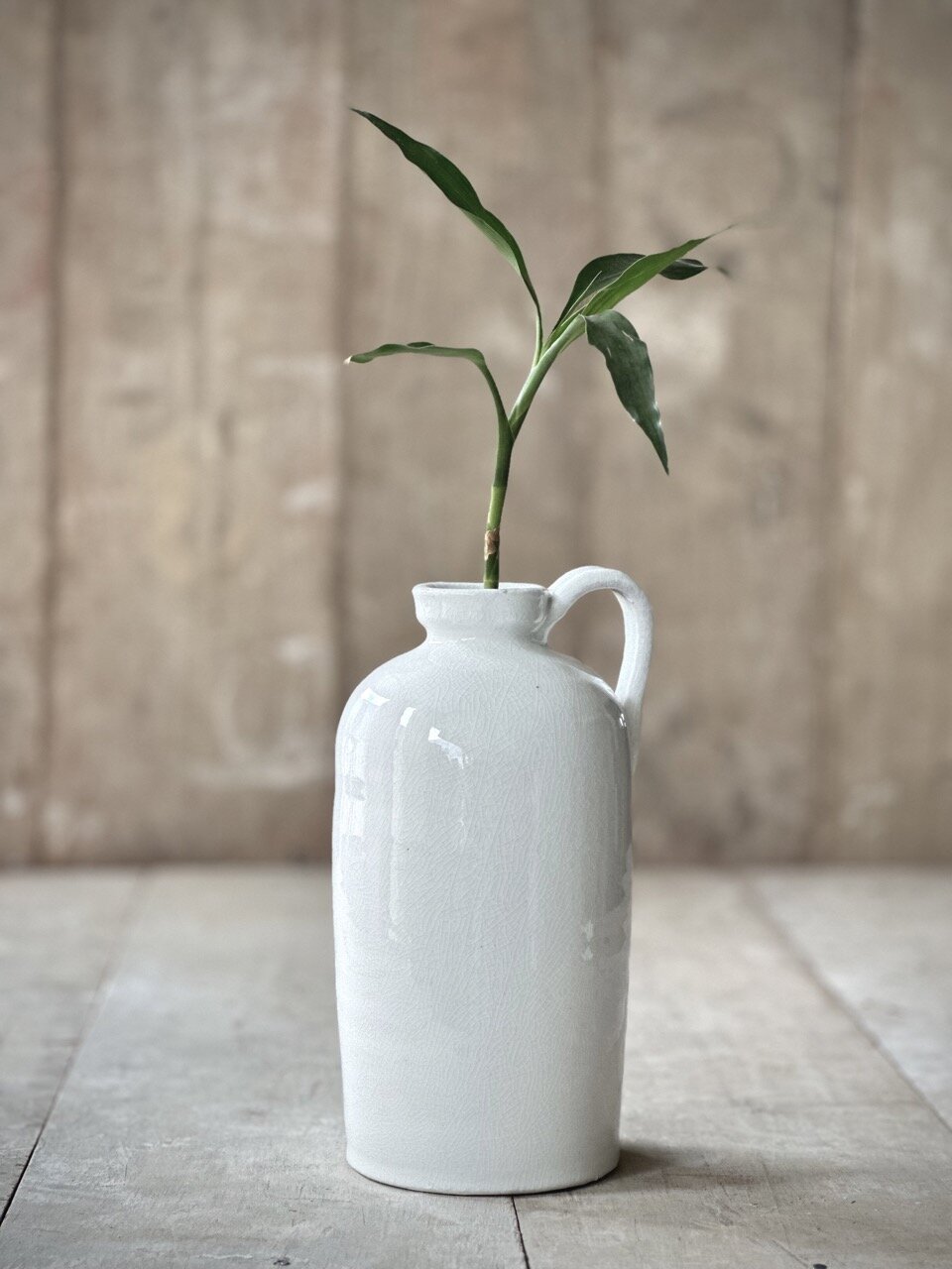 LUC bottle vase with handle, off white crackle glazed