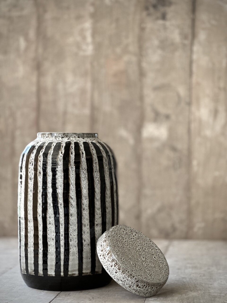 RAC big jar with lid, antique white with black stripes glazed