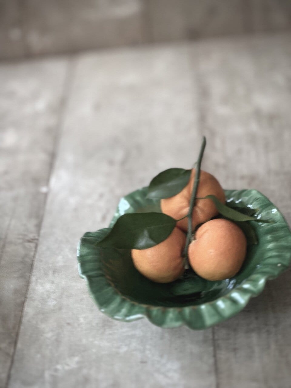NIM small round plate,  green glazed