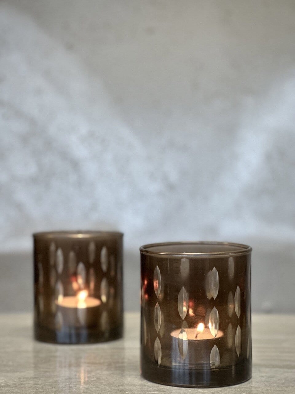 HOLLO tea light candle holder, smoke colour with cutting