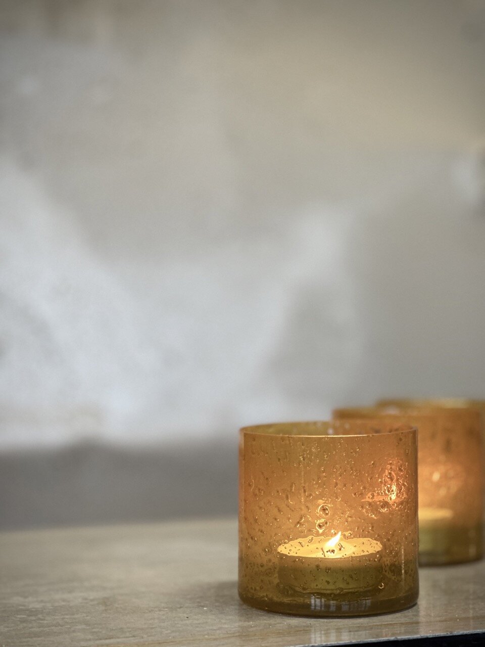 MARI small tea light candle holder, opaque yellow with stone finish