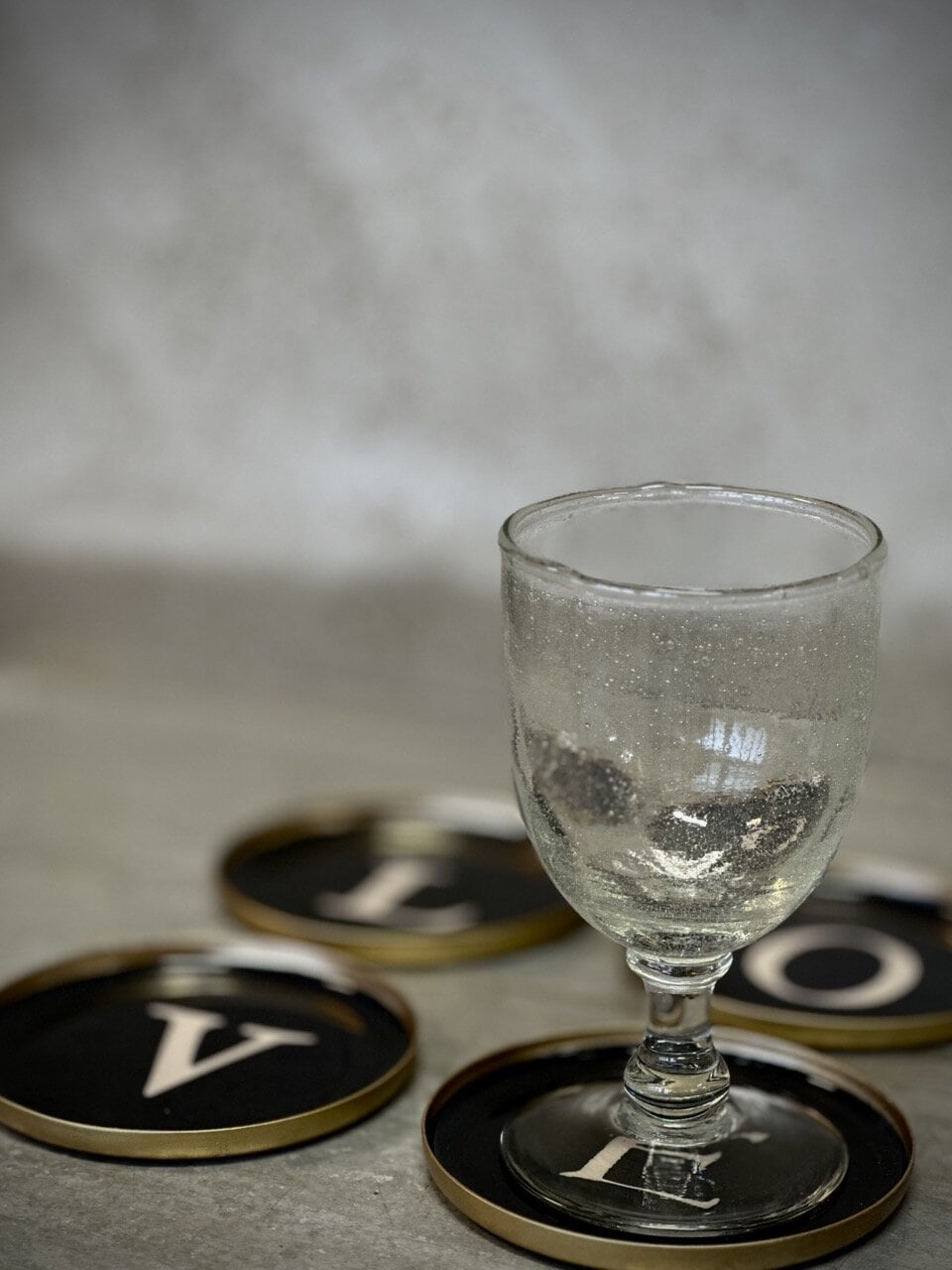 LOVE round metal/enamel coaster, set of 4, black and white
