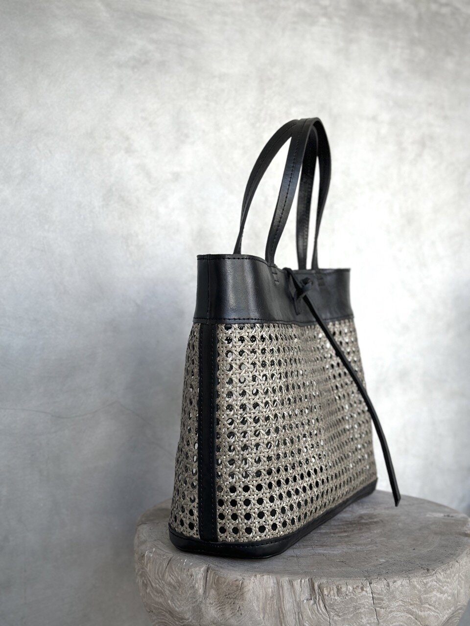 FRANKLIN black leather & blackwash rattan bag