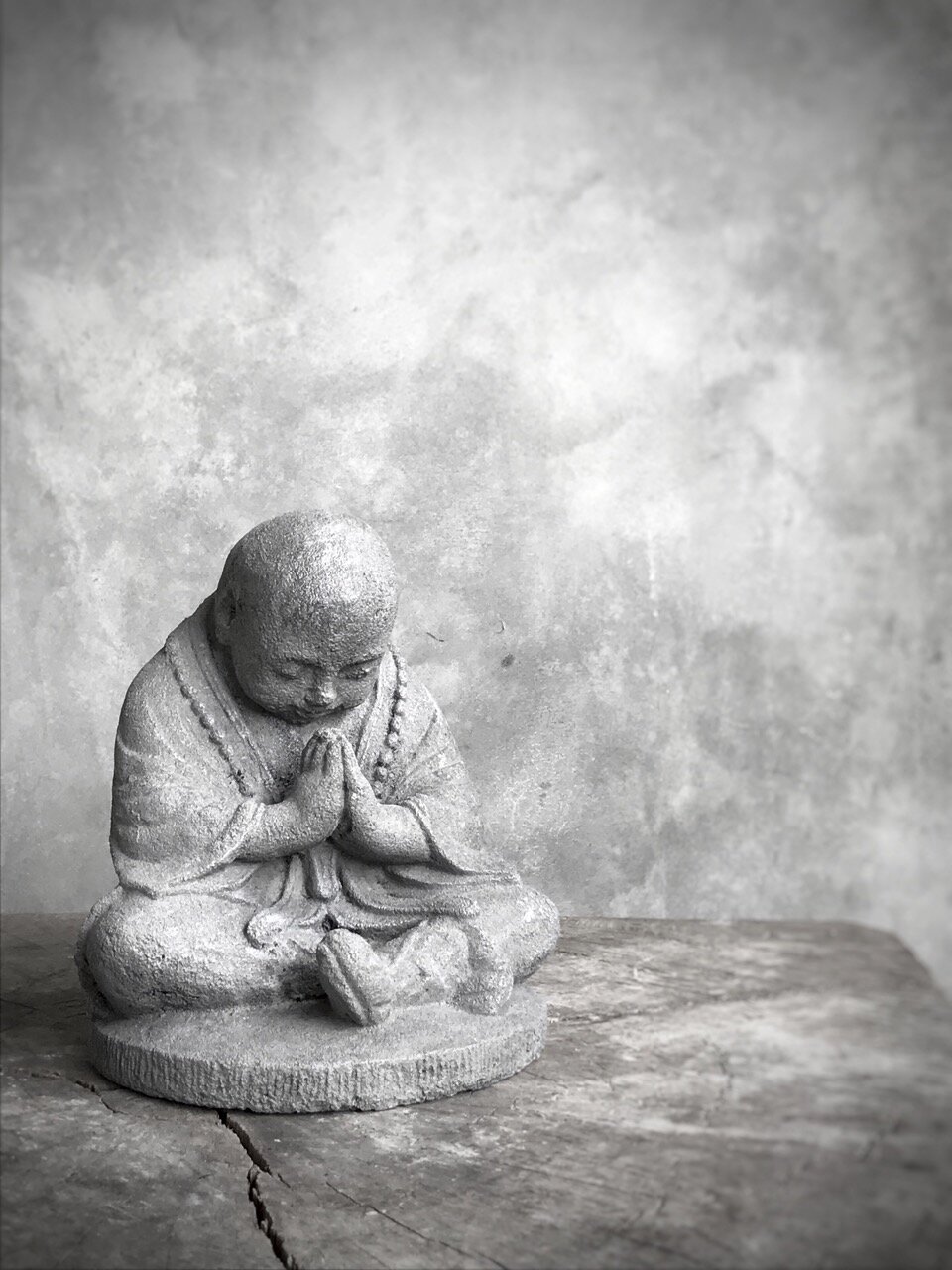 SITTING BUDDHA, antique grey stone